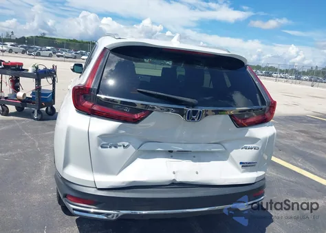 2022 Honda Cr-V Hybrid Touring z USA, uszkodzony, nr VIN 5J6RT6H92NL053822